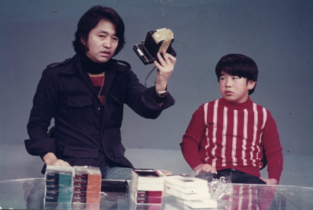 Junichi Yaoi and Masuaki Kiyota in a historical studio photograph